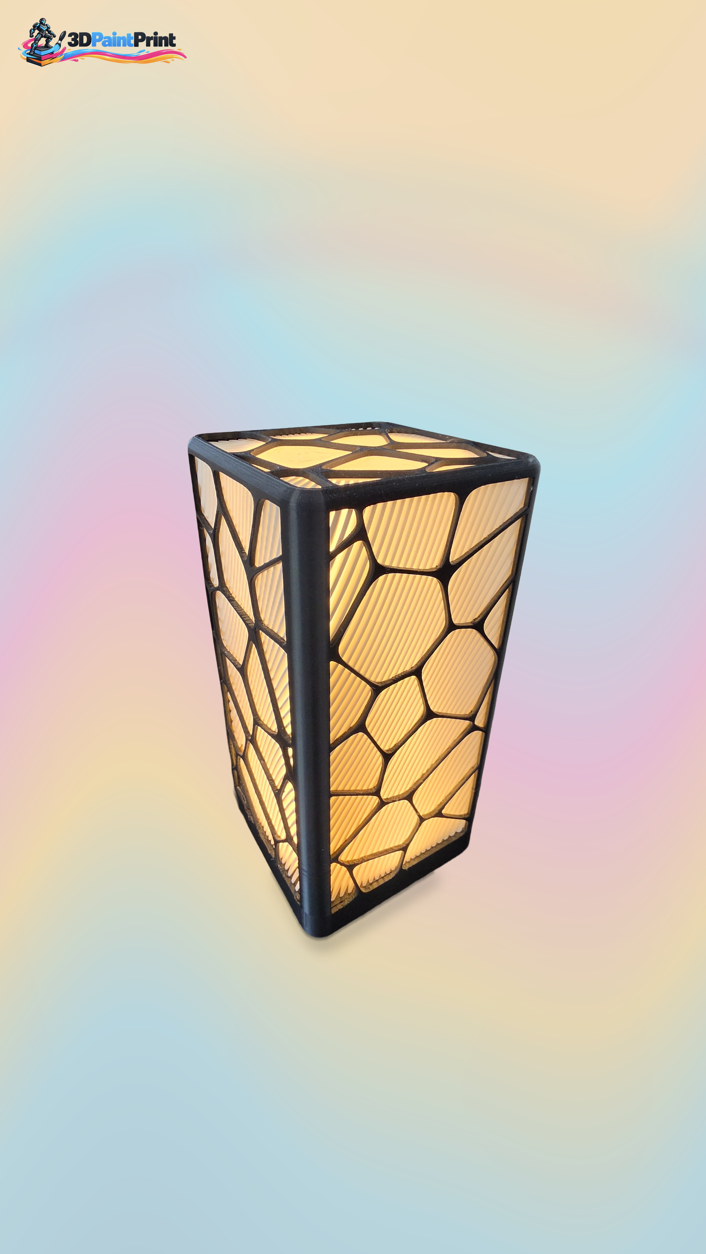 Geometric FDM lamp photographed lit, with its original light and surrounding context preserved.